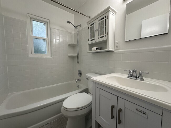 Building Photo - This classic brick rambler, located just around the corner from the West Falls Church Metro Stati...