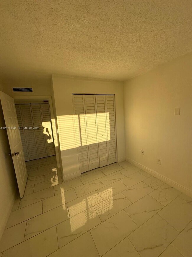 Building Photo - 7401 SW 152nd Ave