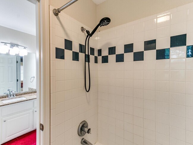 Building Photo - This stunning 4-bedroom, 3.5-bathroom home...
