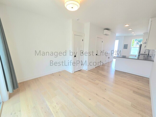 Building Photo - 310 NE 58th Ave