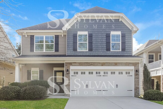Building Photo - The living is easy in this lovely 5 bedroo...