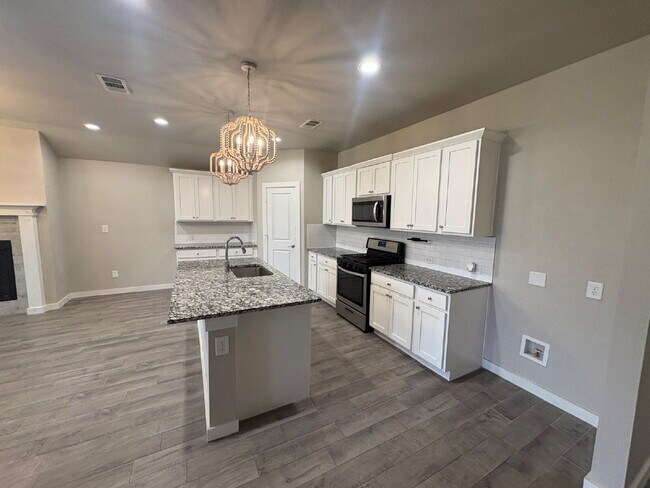 Building Photo - * MOVE IN SPECIAL * Beautiful 4 Bedroom 2 Bath Home in Wollforth!