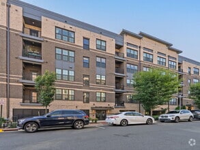 Building Photo - Discover Modern Comfort at Wind Charm Street