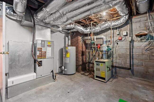 Building Photo - Elegant Multi-Level Brick Residence with Outdoor Oasis