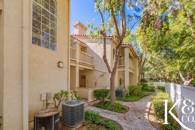 Building Photo - Relaxing Home in Vibrant Community with Pool, Spa, and Courts