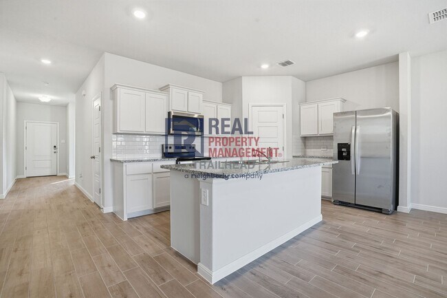 Building Photo - Comfortable 4-Bedroom Layout with Modern Finishes