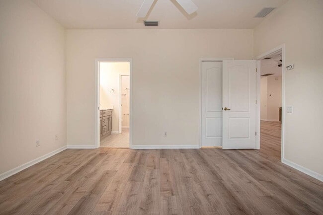 Building Photo - 8419 Whispering Woods Ct