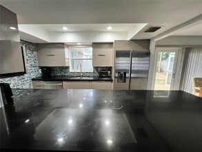 Building Photo - 1410 NE 56th Ct