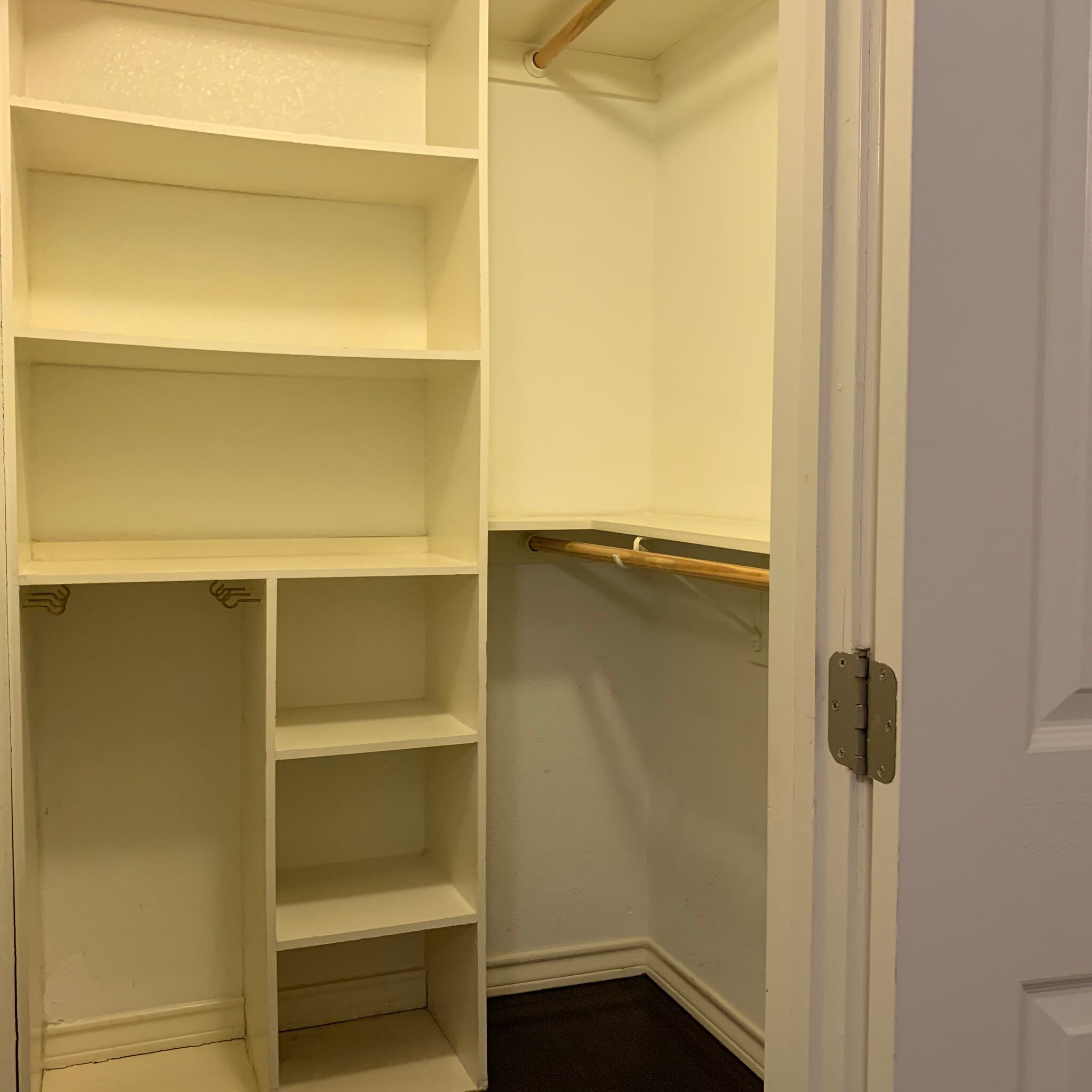 Walk in closet with storage shelves. 1x1 Condo in Hyde Park. 407 E 45th St. Austin. 78751 - 407 E 45th St #116