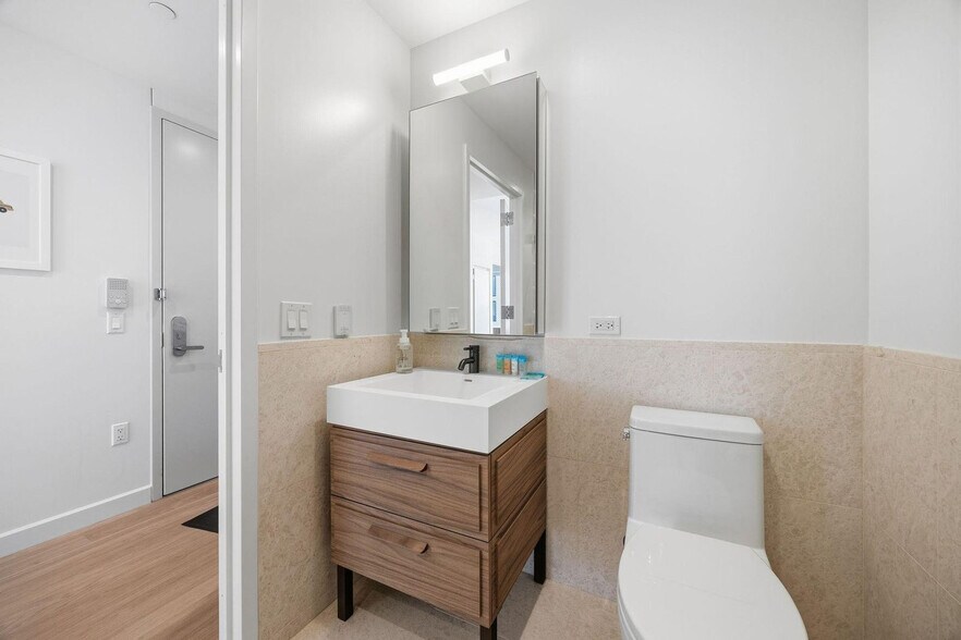 Building Photo - 4-75-75 48th Ave