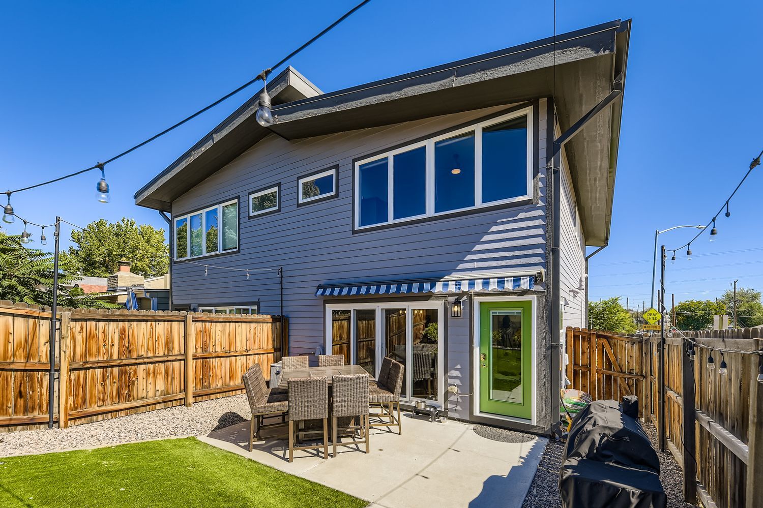 Enclosed backyard w/retractable awning - view from garage - 1197 S Mariposa St
