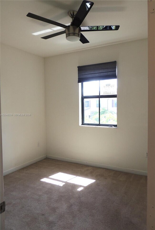 Building Photo - 9336 W 34th Ct