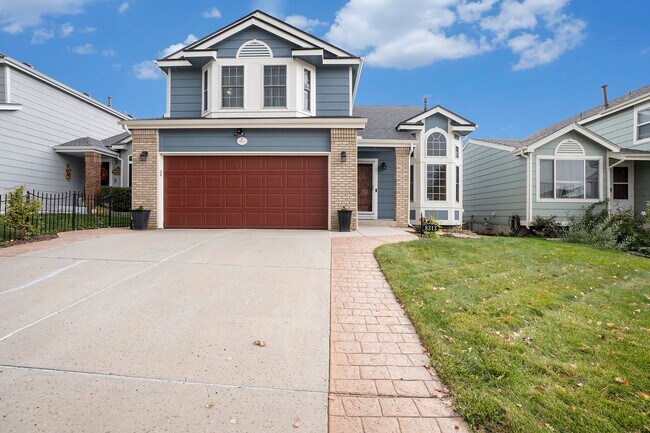 Primary Photo - Spacious 4-Bedroom Home in District 20 with Huge Deck & Fenced Yard