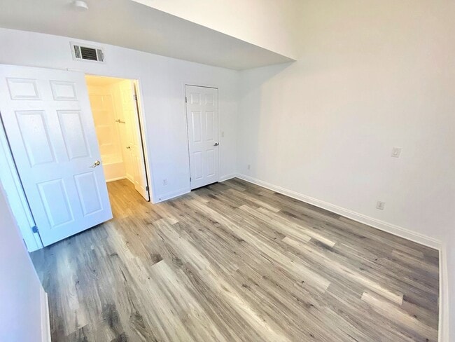 Building Photo - CONDOMINIUM IN A GATED COMMUNITY WITH 2 BE...