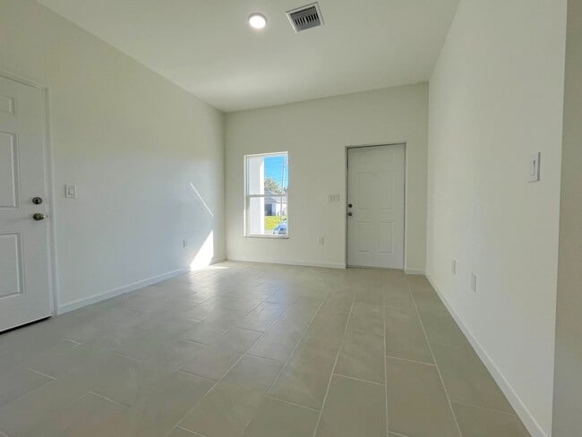 Building Photo - BRAND NEW 2/2/1- SW LEHIGH ACRES