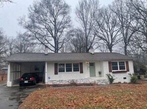 Building Photo - Charming Brick Ranch with Massive Privacy Yard