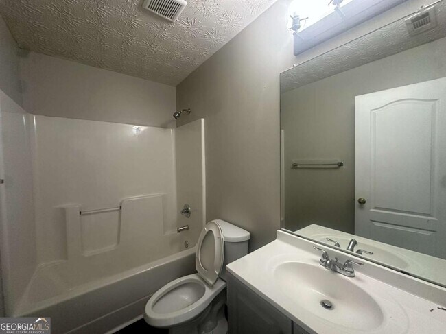 Building Photo - 7467 Petunia Dr