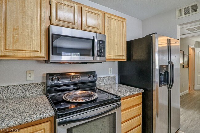 Building Photo - 5055 W Hacienda Ave