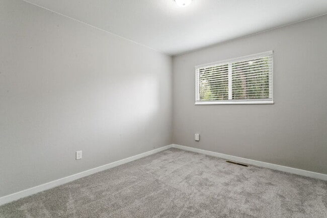 Building Photo - Freshly Renovated 4-Bedroom Home with Over...