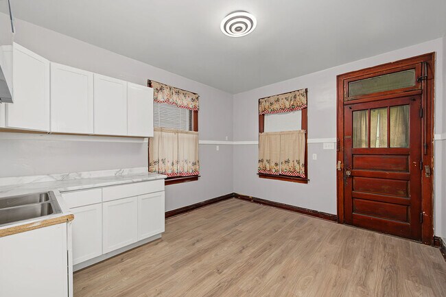 Building Photo - 8748 S Marquette Ave