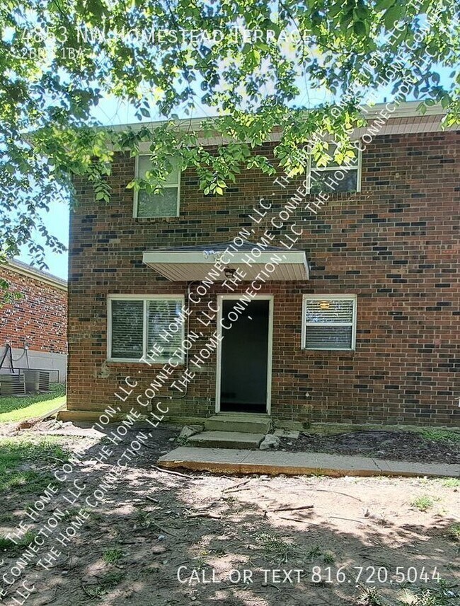 Building Photo - Clean 4-Plex Apartment-Park Hill Schools!