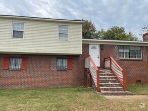 Building Photo - Four Bedroom - Two Bath Home