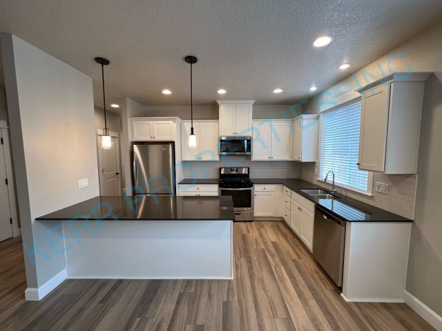 Building Photo - Charming 4-Bedroom Home with 2 Full Baths ...