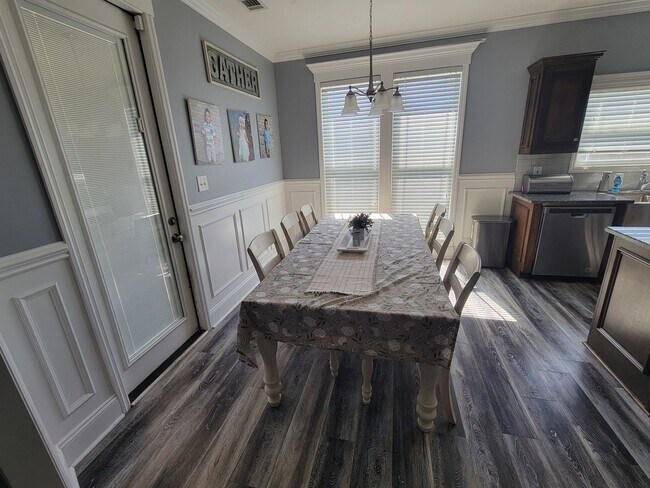Building Photo - Modern 4BR Home with Screened Porch, Granite Kitchen & Fenced Backyard
