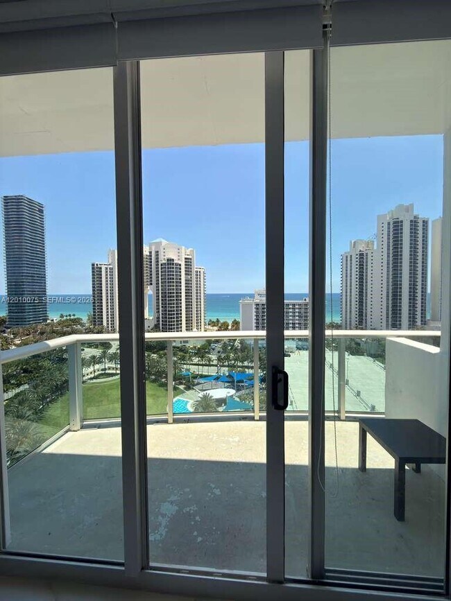 Building Photo - 19370 Collins Ave