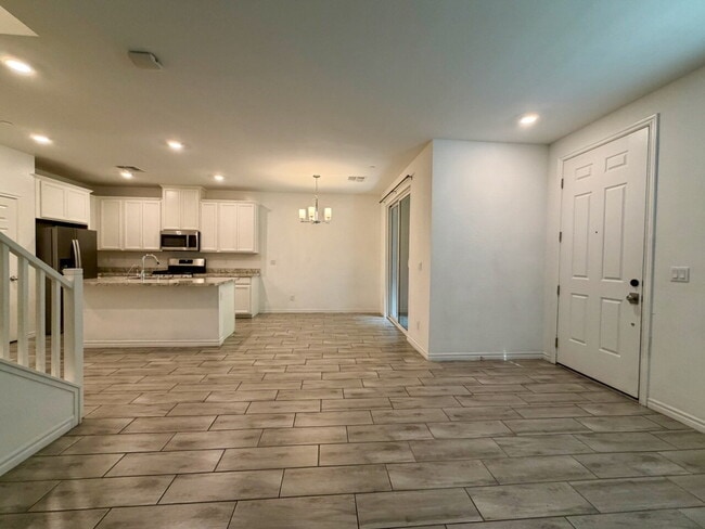 Building Photo - GATED 3 BED 2.5 BATH TOWNHOME WITH 2-CAR GARAGE, COVERED PATIO & COMMUNITY POOL