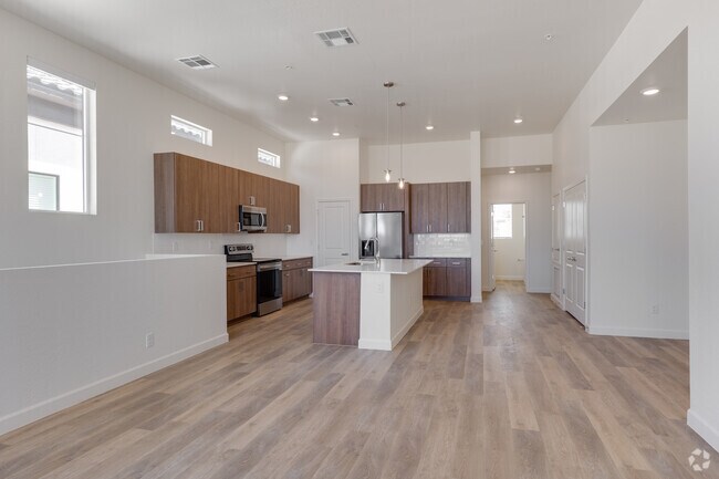 3BR, 2BA - 1,572SF - Living Room/Kitchen - Woodcrest at Power Ranch