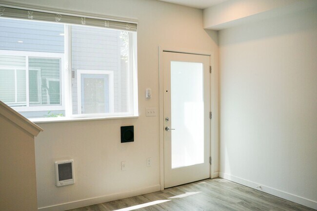 Building Photo - Modern & Sleek One-Bedroom Townhouse Ready...