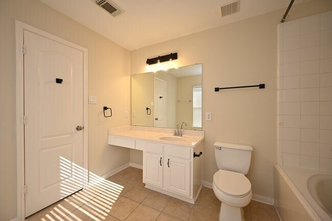 Building Photo - 9403 Coatsworth Dr