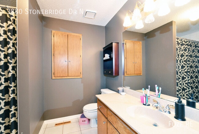 Building Photo - 3880 Stonebridge Dr N
