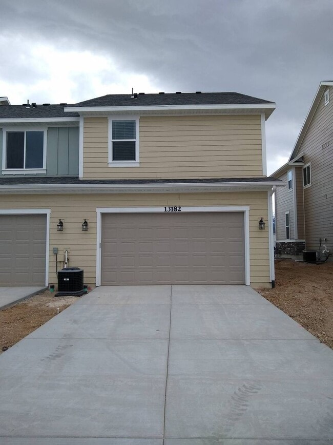 Building Photo - Pet Friendly Gorgeous Row End Townhome w 2 car attached garage!