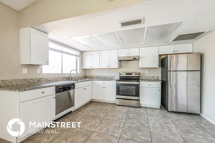 Building Photo - 9022 N 63rd Dr