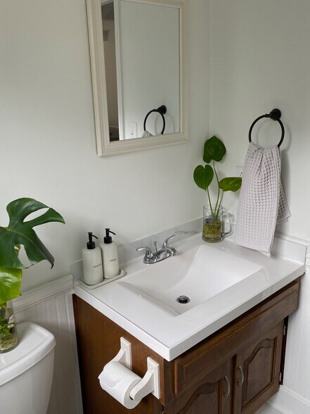 Half bath downstairs-2 - 1131 NE Oak Tree Dr