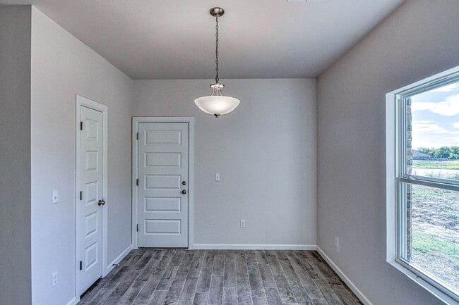 Building Photo - Brand New Construction! Lawn care included!