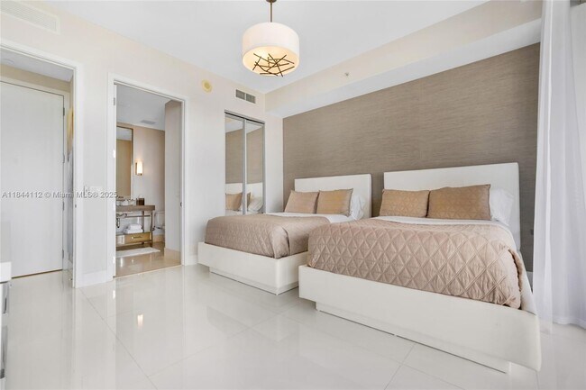 Building Photo - 9701 Collins Ave
