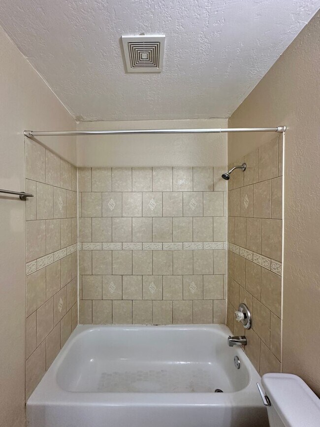 Building Photo - 4 Bedroom