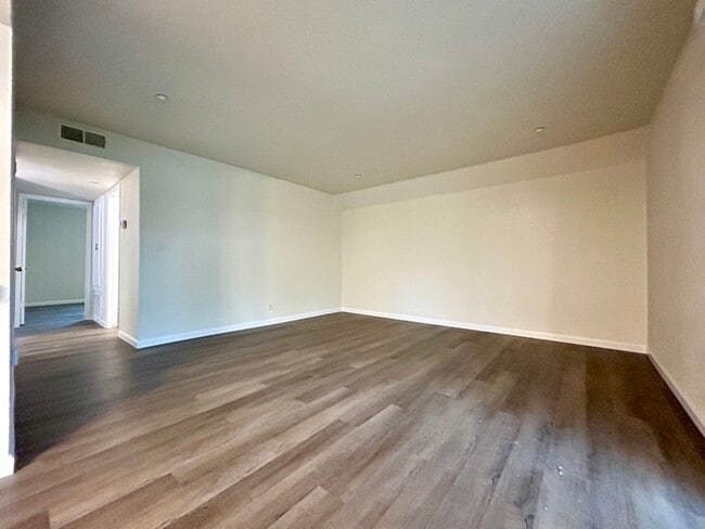 Building Photo - Beautiful Downstairs 2 Bedroom Condo Located In Gated Community Pool + Lake Access!