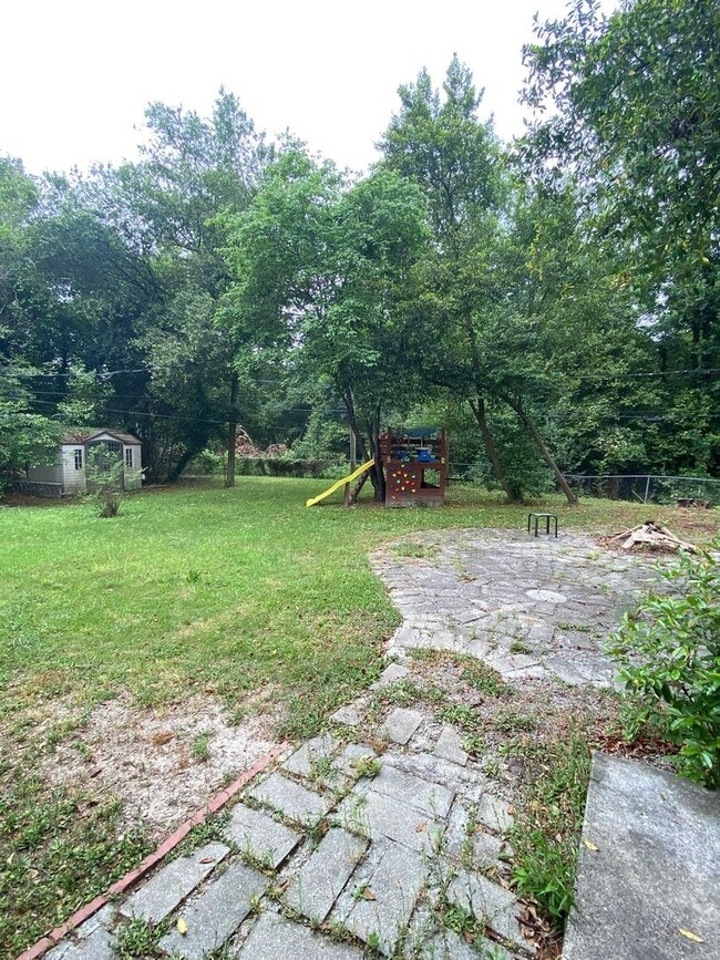 Building Photo - Spacious 3BR/2BA with Open Layout and Large Backyard