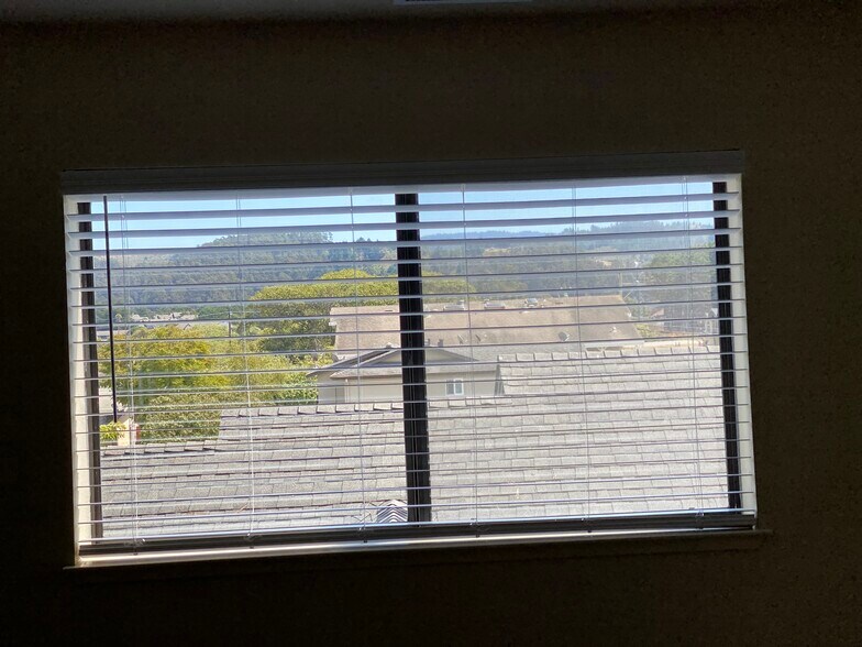 View of East facing hills from primary top floor bedroom - 445 Willow Ave