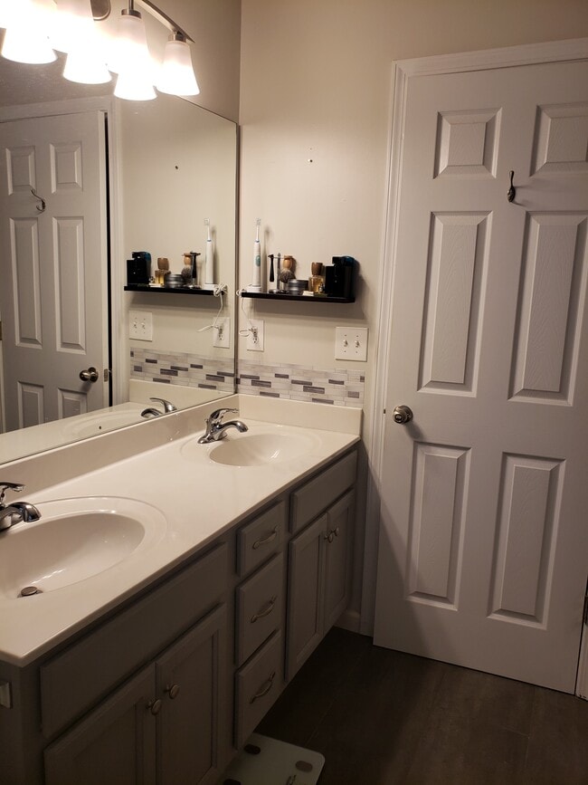 Lots of counter space in primary full bath. - 820 Laramie Ct