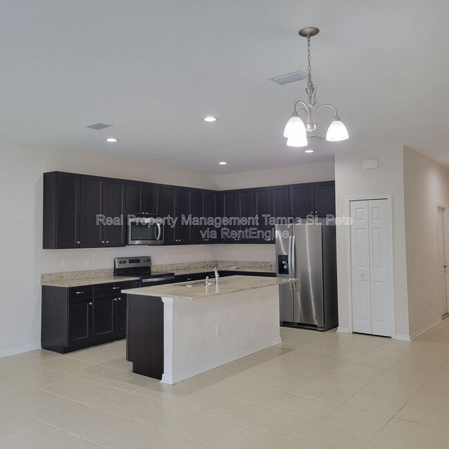 Building Photo - 6409 Tillandsia Pl