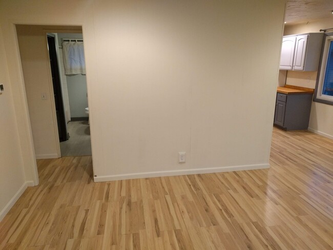 Main front room - hallway to bathroom and two bedrooms. - 4225 Sheffield Road