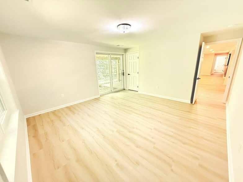 Light filled basement bedroom - 9248 Wood Glade Dr