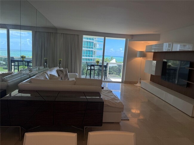 Building Photo - 10275 Collins Ave