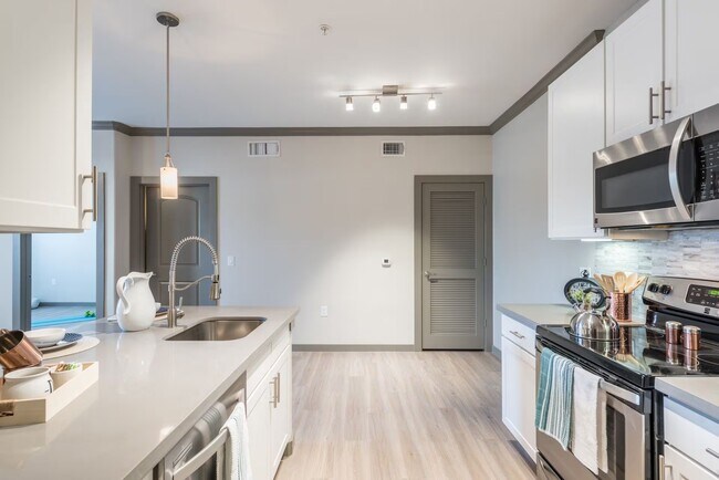 Building Photo - Elevated Lifestyle, With 1 Month Complimentary Rent!