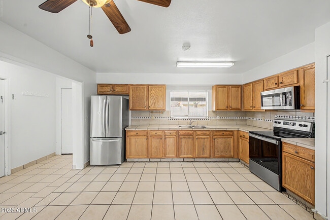 Building Photo - 6944 W Solano Dr N